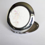 Round compact mirror. - whitworthprints